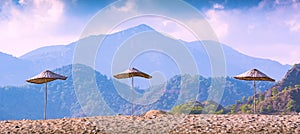 The straw umbrellas on a Cirali beach