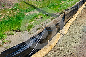 Straw wattles and plastic fence