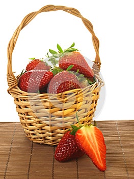 Strawberries in a basket, isolated
