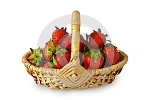 Strawberries in the basket isolated on white