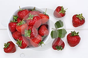 Strawberries berry fruits in bowl from above