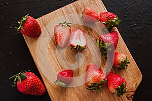 Strawberries in a black background photo