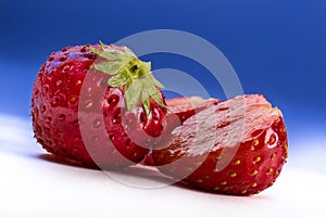 Strawberries on blue and white background