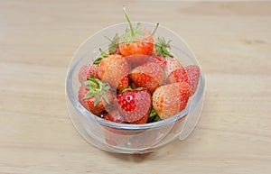 Strawberries in a bowl with background