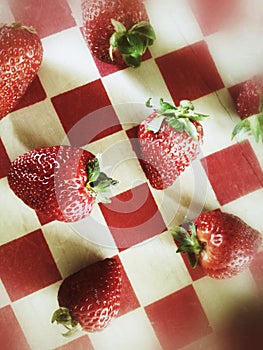 Strawberries on checkerboard