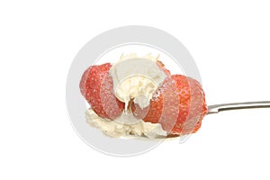 Strawberries and clotted cream in a spoon photo