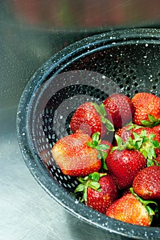 Strawberries in a colander