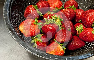 Strawberries in a colander