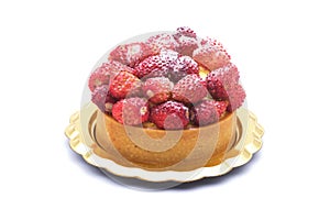 Strawberries and cream cake or small round cake. Delicious sweet desert.