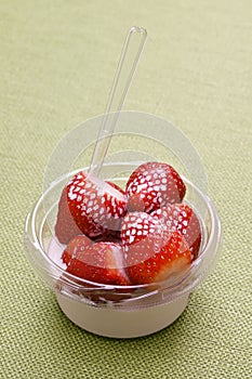 strawberries and cream, a small bowl, English summer specialty