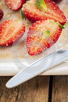 Strawberries cut with sugar