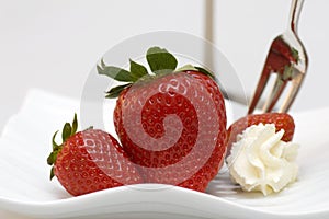 Strawberries with dessert fork