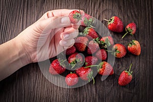 Strawberries with hand pick up