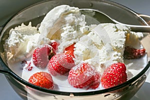 Strawberries with ice cream and milk