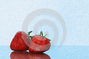 Strawberries isolated. Strawberry with leaf isolate. Two whole strawberries on white and blue. Side view