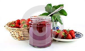 Strawberries and jam in jar