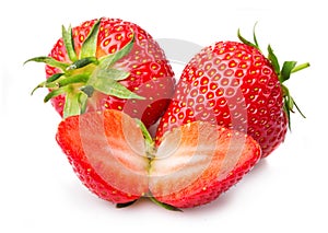 Strawberries with leaves and slices isolated on a white