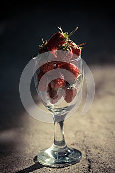 Strawberries in a long stemmed glass photo