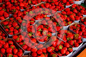 Strawberries on a market stall.