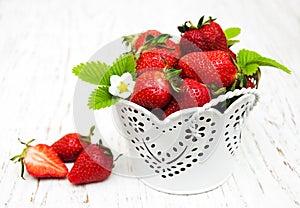 Strawberries in a metal pot