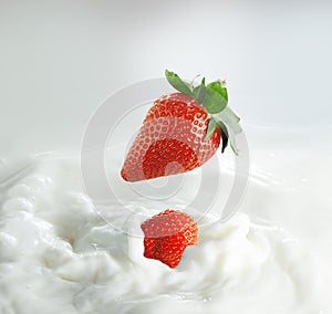 Strawberries in milk splash