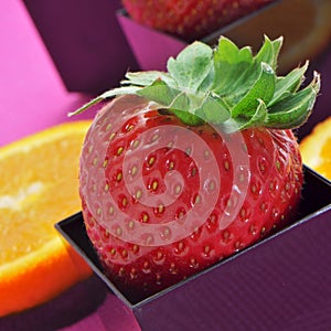Strawberries and orange slices