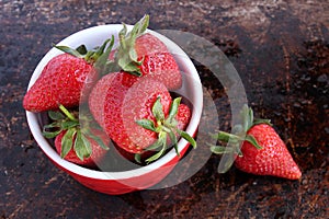 Strawberries in red bowl