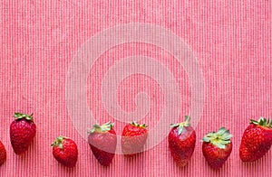 Strawberries on red tablecloth