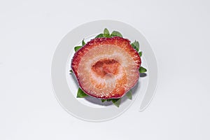 strawberries in a section on a white background. isolate