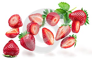 Sliced strawberry flying in the air isolated on white background