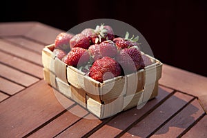 Strawberries in a small wooden basket