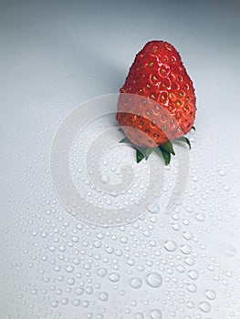 Strawberries surrounded by water