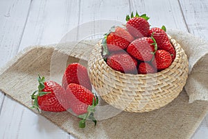 Strawberries on a table in a basket