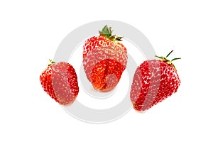  strawberries. Three fruits on white background photo