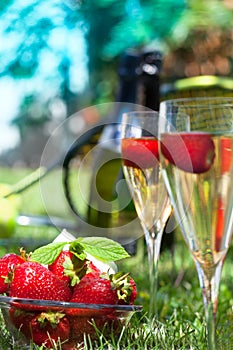 Strawberries with whipped cream and champagne