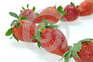 Strawberries on white