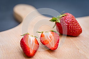 strawberries on wooden board