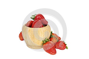 strawberries in a wooden bowl on a white background, isolate