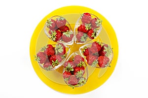 Strawberries on the yellow plate