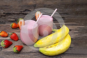 Strawberry and banana smoothie colorful fruit juice milkshake blend beverage healthy.