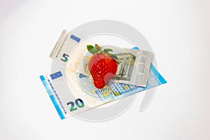 Strawberry on banknotes