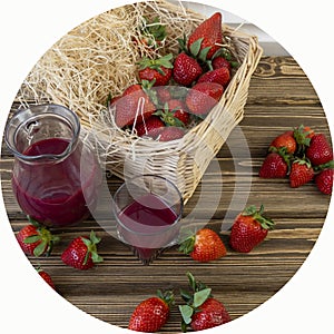 Strawberry in basket and on table on wooden background, strawberry juice in jug