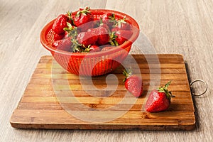 Strawberry berries in a colander