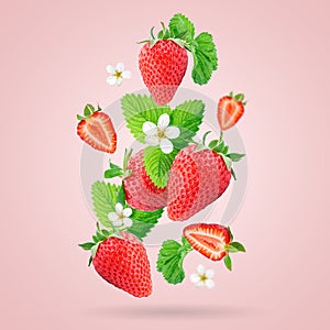 Strawberry berries levitating on a pink background. Strawberry background.