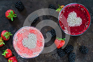 Strawberry and blackberry smoothies garnished with chia seeds