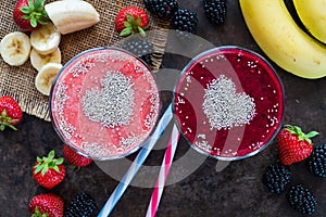 Strawberry and blackberry smoothies garnished with chia seeds