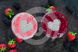 Strawberry and blackberry smoothies garnished with chia seeds