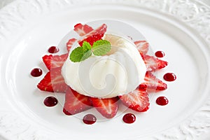Strawberry blancmange garnished