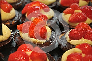 Strawberry and blue berry cake at baker shop in Capictal