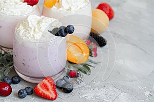 Strawberry, blueberry smoothie on light background. well being and weight loos concept. milkshake with fresh berries. healthy photo